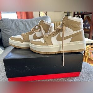 Nike Air Jordan Women’s Tan and White High-Top Sneakers